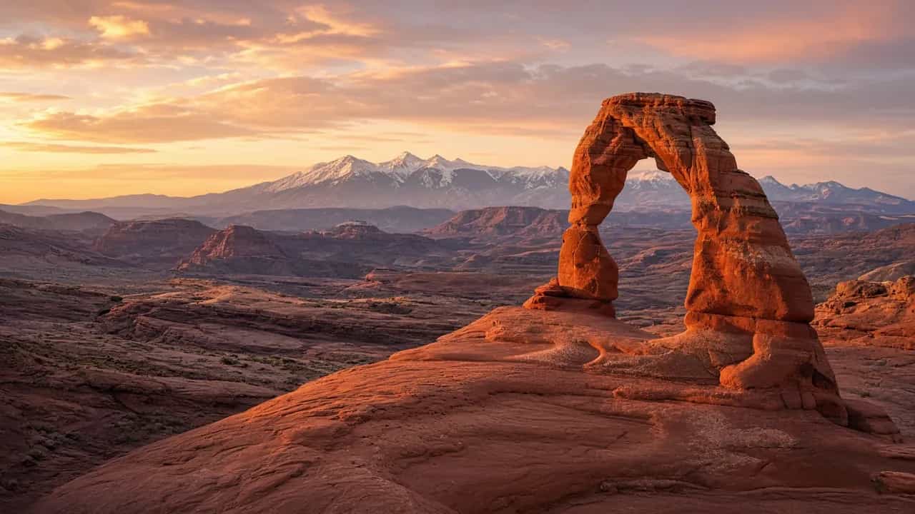 Delicate Arch in Arches National Park glowing at sunset, Utah